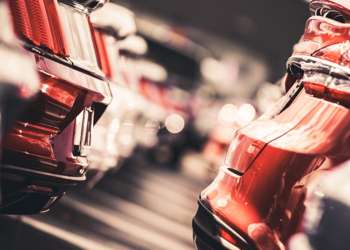 Car Dealer Vehicles Lot Closeup Photo. Modern Cars For Sale.